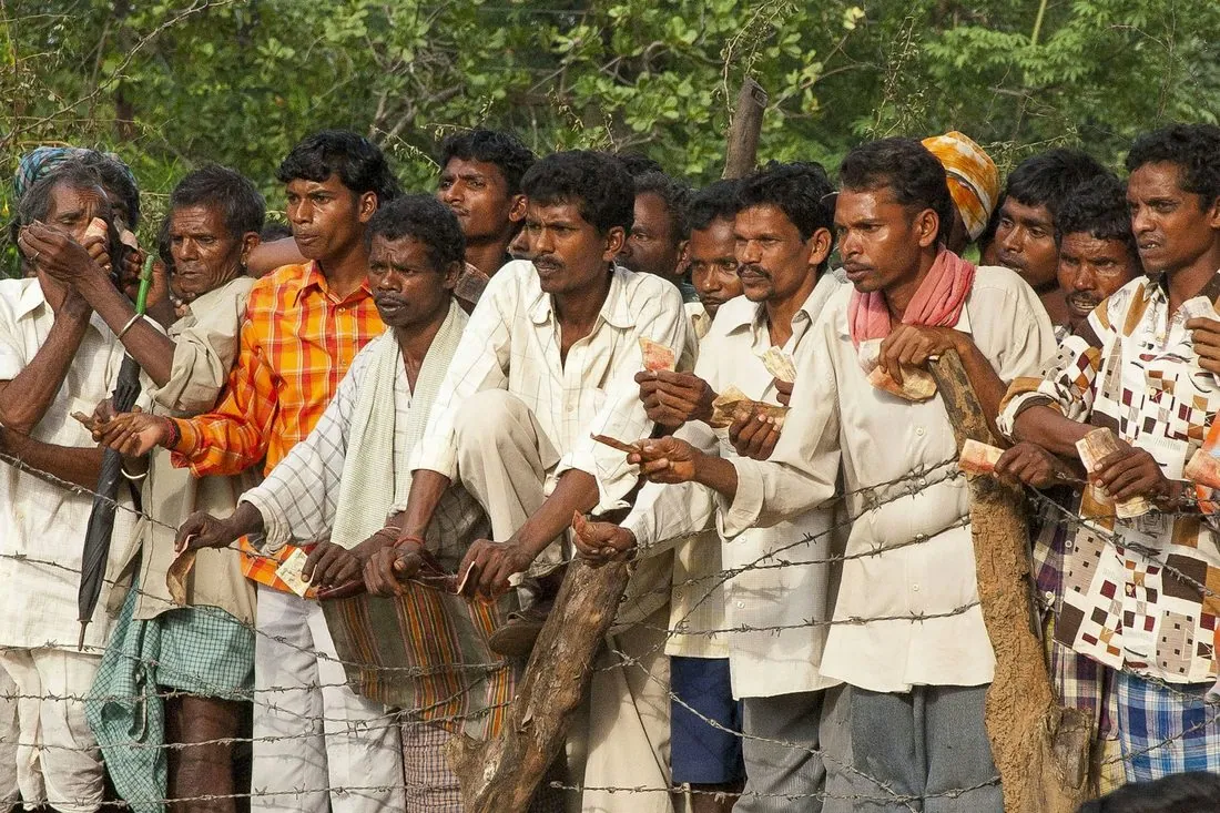A crowd of men at a village gathering