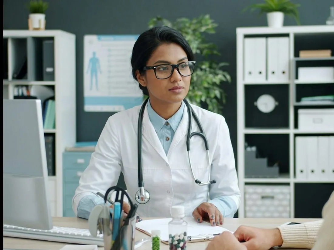 A doctor with a stethoscope in a clinic